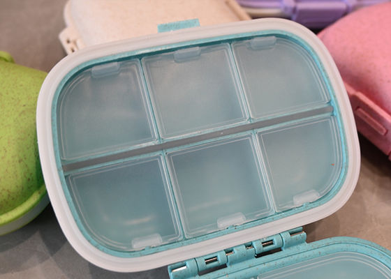 Weekly Pill Organizer with 8 Compartments: Convenient Medicine Travel Case