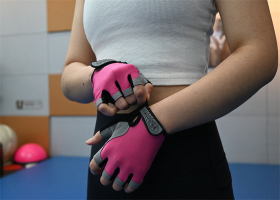 Pink lightweight half-finger workout gloves offer comfort and grip during weightlifting sessions.