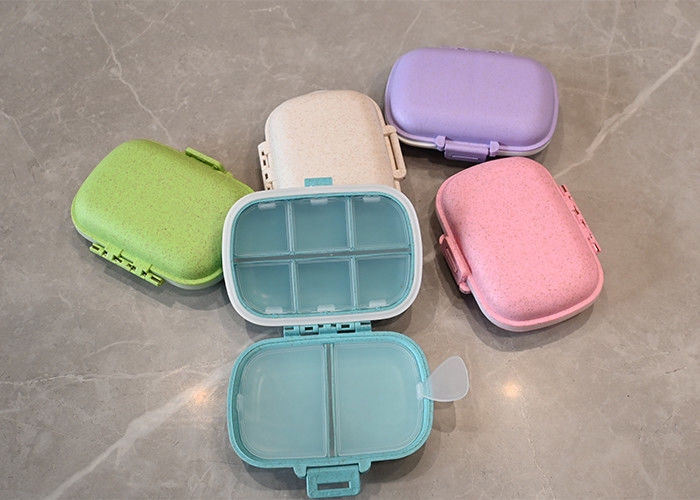 Weekly Pill Organizer with 8 Compartments: Convenient Medicine Travel Case